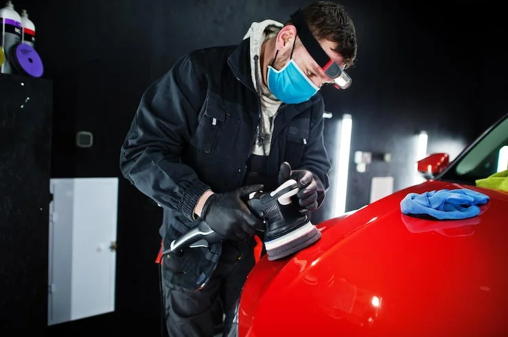 Ceramic coating application as part of car detailing service in Dubai service